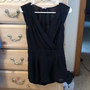 Black romper with see through back